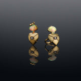 18k Gold Sacred Love Ring18k Gold Ring inspired by sacred heart imagery with a Hand carved Opals the flame and a diamond set in the eye of the heart for protection.18k Gold Sacred Love Ring18k Gold Ring inspired by sacred heart imagery with a Hand carved