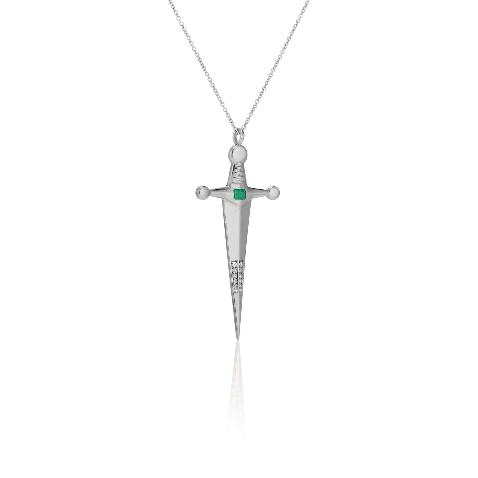 Necklaces Platinum & Emerald Kelly Sword Pendant A Luxe sword 18k Gold Kelly Sword Pendant for the individual wanting to make a powerful statement. Our Jewelry is proudly idealized, and produced in NYC. KIL N.Y.C.