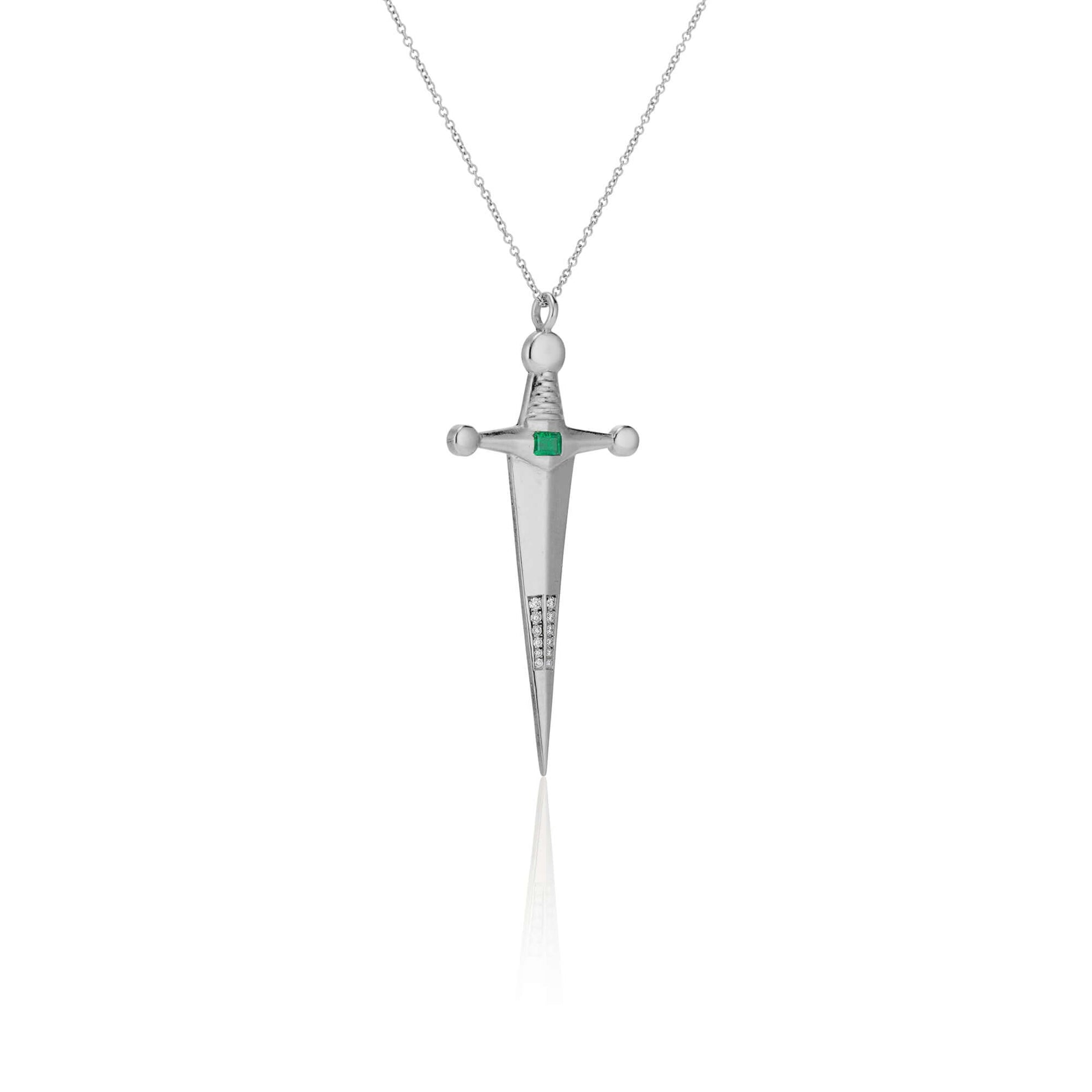 Necklaces Platinum & Emerald Kelly Sword Pendant A Luxe sword 18k Gold Kelly Sword Pendant for the individual wanting to make a powerful statement. Our Jewelry is proudly idealized, and produced in NYC. KIL N.Y.C.