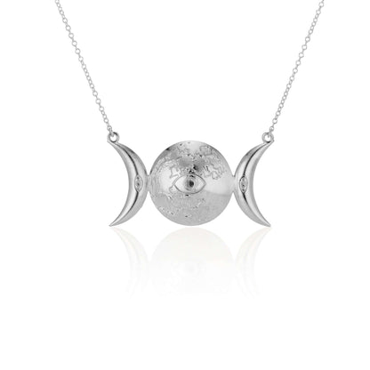 Selene PendantInspired by the Greek Goddess of the Moon, Selene, this pendant features the moon in several phases, adorned with an eye for protection. This piece can be made in sterling silver, with additional plating options for 18k Gold Vermeil. We also