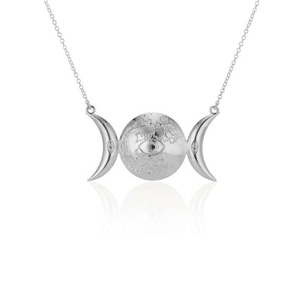 Selene Pendant Inspired by the Greek Goddess of the Moon, Selene, this pendant features the moon in several phases, adorned with an eye for protection. This piece can be made in sterling silver, with additional plating options for 18k Gold Vermeil. We als