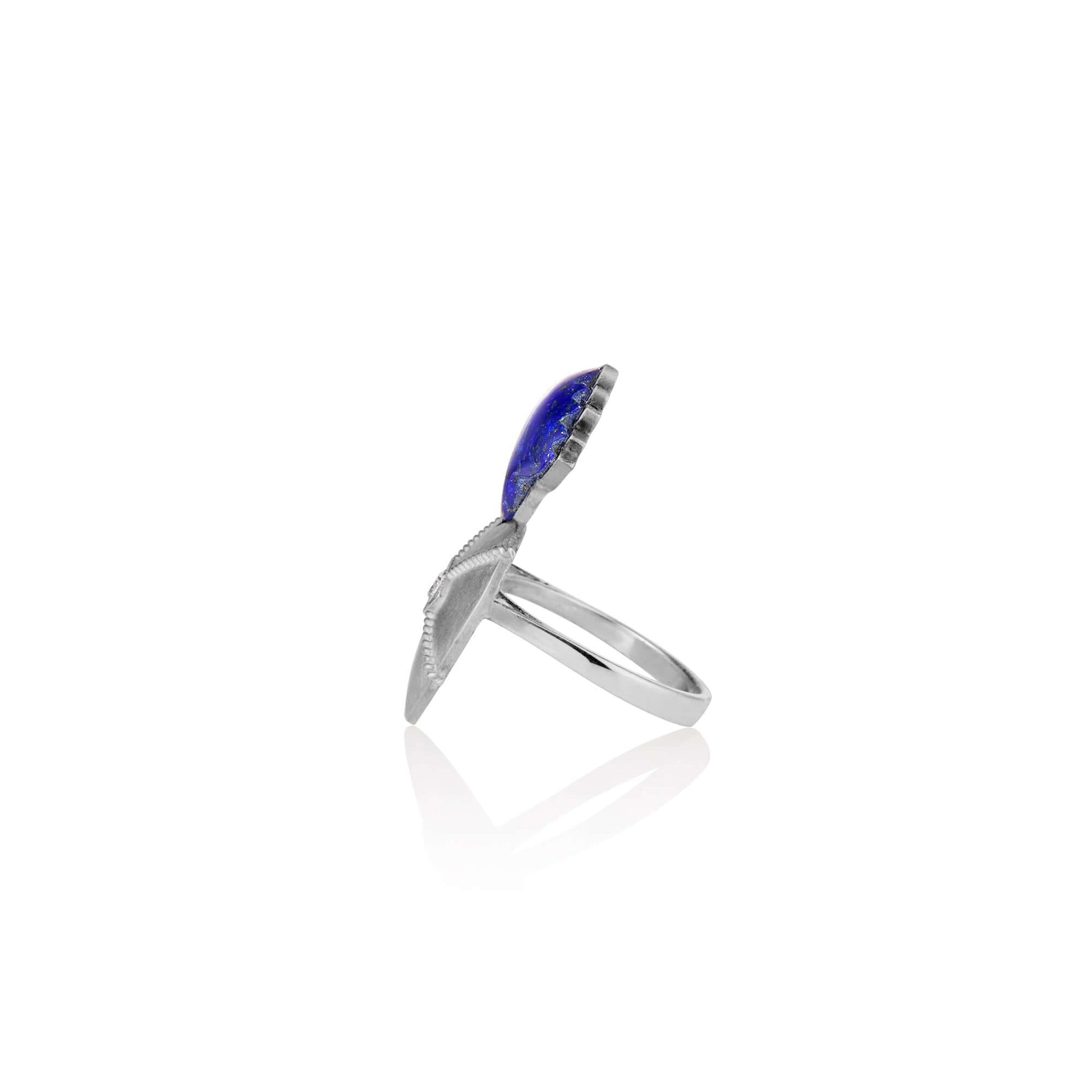 Sacred Love RingSterling Silver Ring inspired by sacred heart imagery with a Hand carved Lapis Lazuli as the flame and a diamond set in the eye of the heart for protection.Sacred Love RingSterling Silver Ring inspired by sacred heart imagery with a Hand c