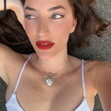 Varlow PendantA pendant inspired by the 3 of swords tarot card, entirely hand carved and with a protective eye. This pendant is based on a custom tattoo on our C.E.O.’s thigh. 10% of the proceeds from this pendant will be donated to New Destiny Housing in