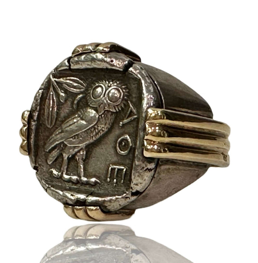 Ancient Greek Coin Ring Tet. DrakmaAr Tetradrachm, Head of Athena wearing a crested helmet, adorned with olive leaves and palmette. Reverse: Owl facing straight, live sprig and crescent behind, all within incuse square. (17.10gm) ATTICA (VF/G). Condition: