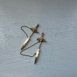 Agape Sword EarringsA fresh take on the sword earring and an evolution from our earlier sword earrings from 2019. These statement making earrings are inspired by antique jabots, sword or arrow pins that would be worn on a jacket or scarf. Created entirely