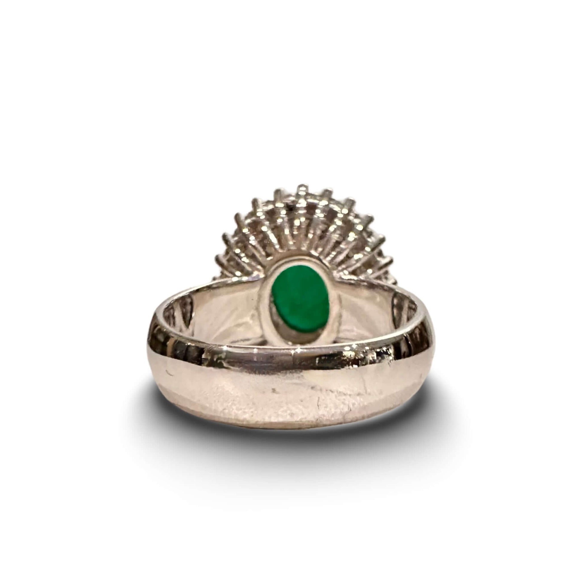 Vintage Diamond and Jade Ring in 14k White GoldGorgeous Jade Cabochon set in a halo of white diamonds. TCW of the diamonds is 0.75cts. Ring is 14k White Gold Condition: Normal antique wear Metal: 14k White Gold Dimensions: Size 6Vintage Diamond and Jade R