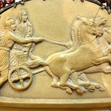 Antique Victorian Lava Cameo Brooch, Garnet Surround, 1860sAntique Victorian Lava Cameo Brooch, Garnet Surround, 1860s, Roman Chariot Condition: Normal antique wear Metal: Silver Dimensions: 2.75", 32.1g Antique Victorian Lava Cameo Brooch, Garnet Surroun