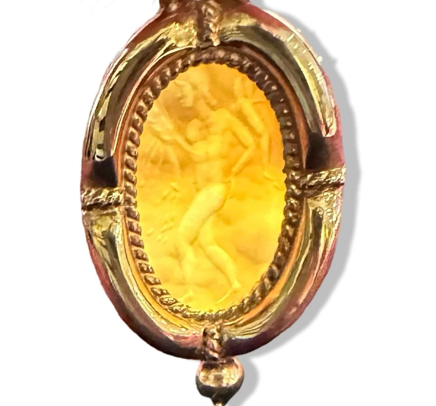 Carnelian Intaglio set into 18k gold, Standing WarriorCarnelian Intaglio set into 18k gold, Standing Warrior, 18k, Condition: Normal antique wear Dimensions: 1.25", 10.1g Carnelian Intaglio set into 18k gold, Standing Warrior Carnelian Intaglio set into 1