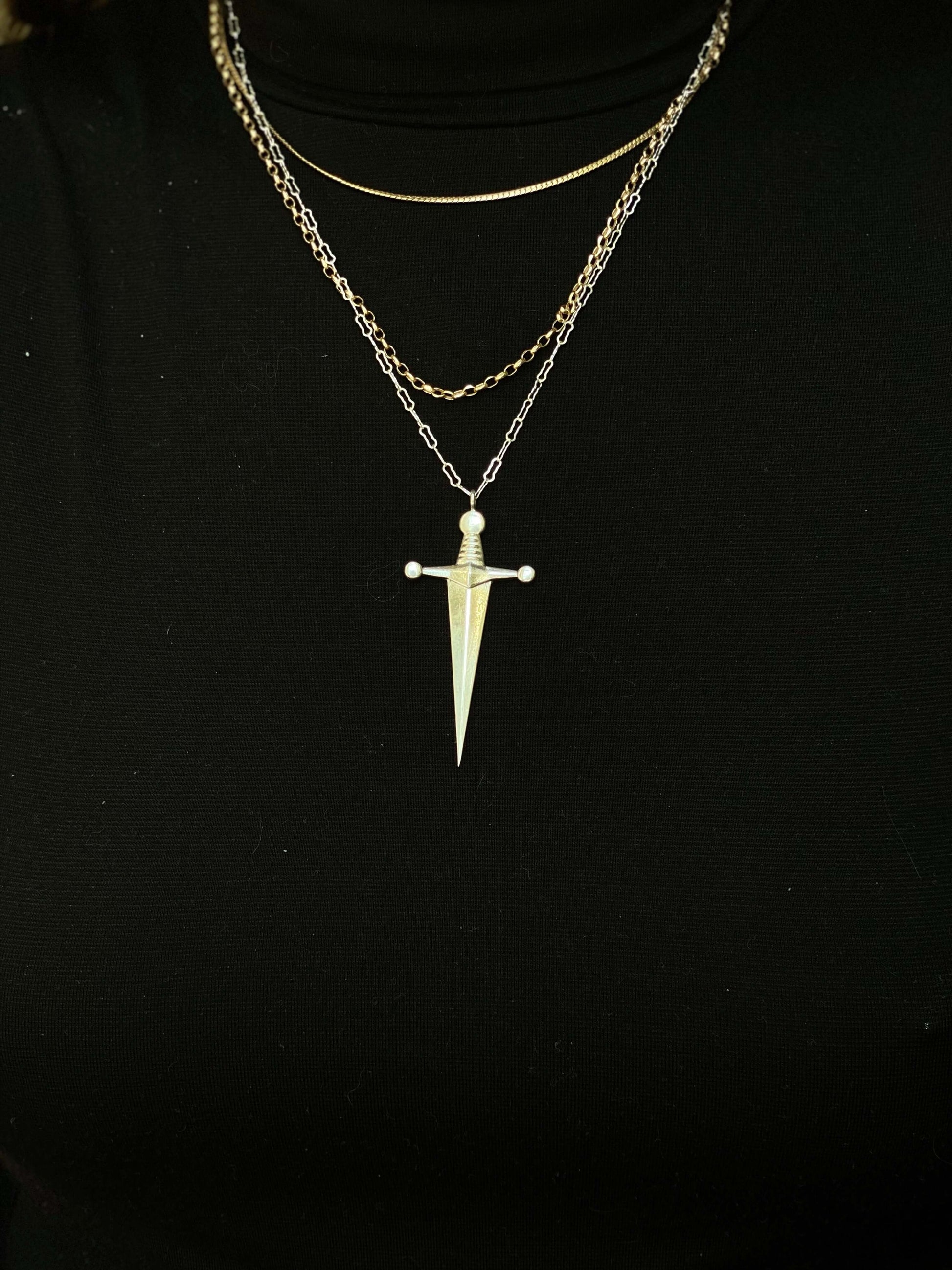 Kelly Sword PendantA sword pendant to show the warrior in each of us Dedicated to my friend and social activist, Kate Kelly. 10% of each sale before tax will be donated to Equality Now, a non profit organization dedicated to fighting for gender equality w