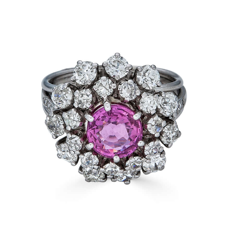 Mid Century Pink Sapphire Ring2.04ct Sapphire, 18k WG, 30 siblge Cut & Old European Cut Diamonds (approx 2ct) This gorgeous ring from the Mid Century period features a unique 2.04 ct pink sapphire surrounded by thirty (30) (approximately 2 cts) of Old Eur