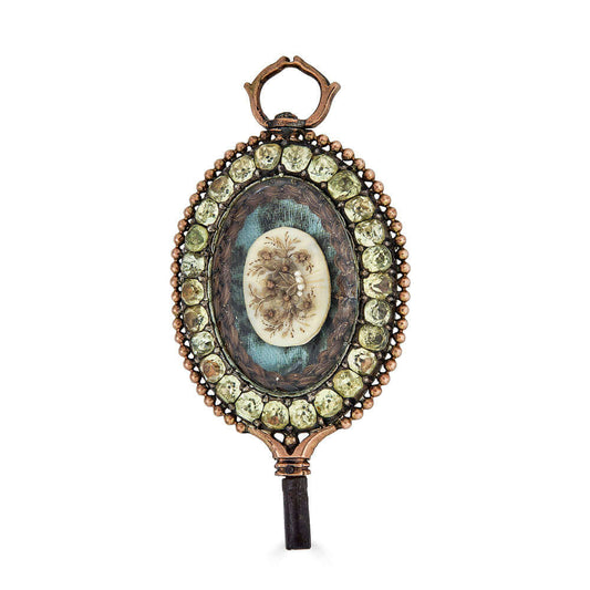 Antique Mid 1700s Portuguese Watch Key, 19k, Chrysoberyl, Hairwork, sepia in portugueseStep into the elegance of the past with our Antique Mid 1700s Portuguese Watch Key, a unique artifact from a bygone era. Crafted from luxurious 19k gold, this exquisite