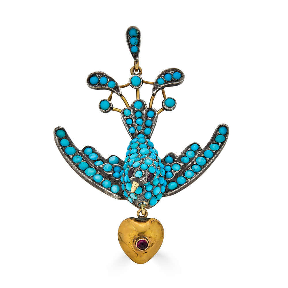 Antique Victorian Bird Pendant, low karat gold, pave turquoise, garnet eyes, hearthis exquisite pendant features a beautifully detailed bird, symbolizing freedom and love, crafted from low karat gold. The bird's body is adorned with pavé turquoise, adding