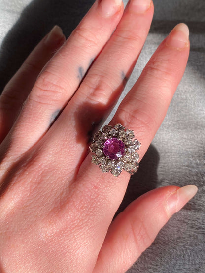 Mid Century Pink Sapphire Ring2.04ct Sapphire, 18k WG, 30 siblge Cut & Old European Cut Diamonds (approx 2ct) This gorgeous ring from the Mid Century period features a unique 2.04 ct pink sapphire surrounded by thirty (30) (approximately 2 cts) of Old Eur