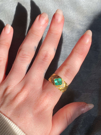 Vintage GIA Certified Columbian Emerald Ring, 18k, Step Cut Emerald 1 carat, Diamonds VS, F Color, C. 1980Most likely made during the 1980s, this juicy vintage emerald ring is sure to make your mouth water. Weighing in at just over 1ct, this step cut emer