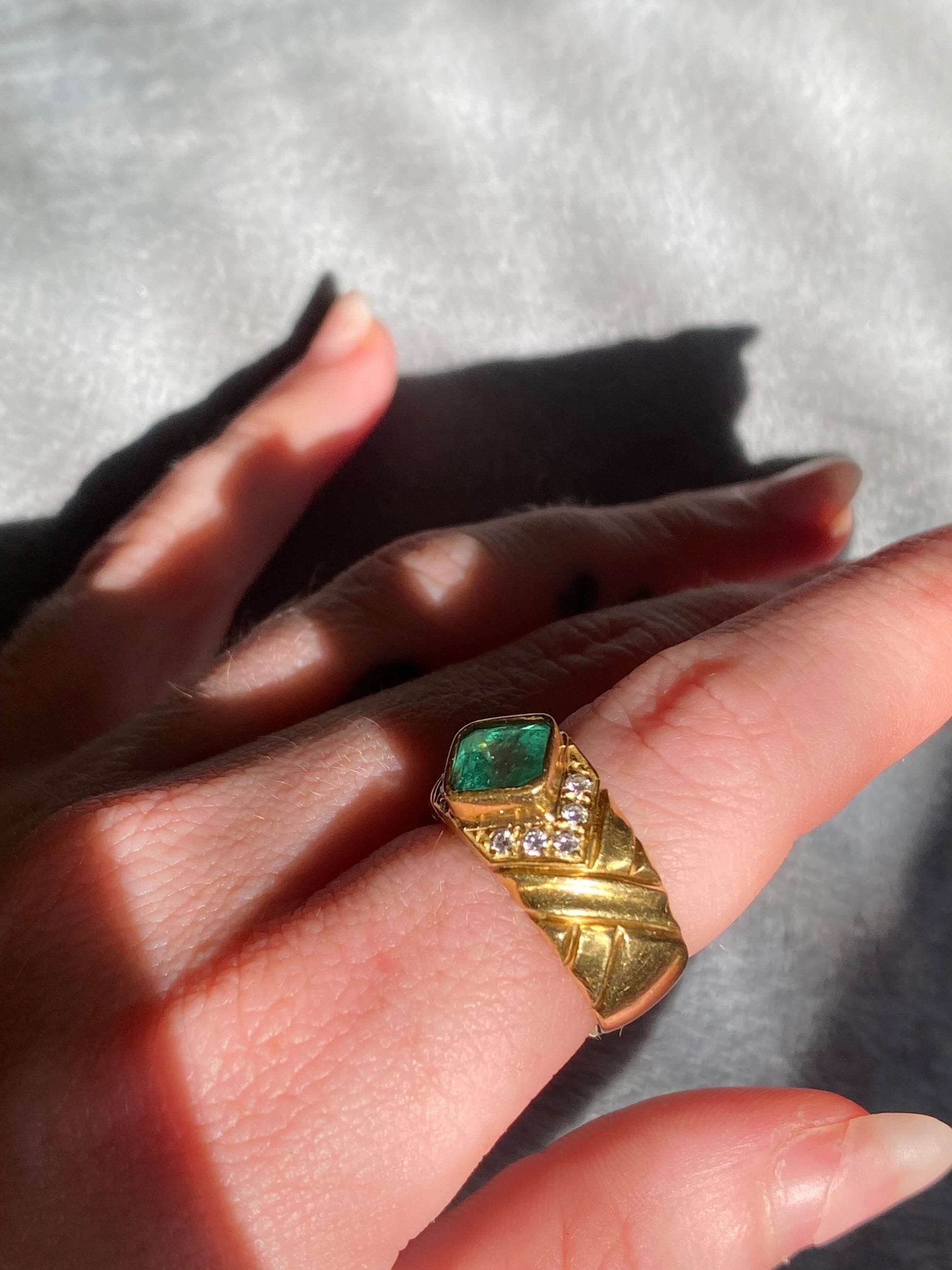 Vintage GIA Certified Columbian Emerald Ring, 18k, Step Cut Emerald 1 carat, Diamonds VS, F Color, C. 1980Most likely made during the 1980s, this juicy vintage emerald ring is sure to make your mouth water. Weighing in at just over 1ct, this step cut emer