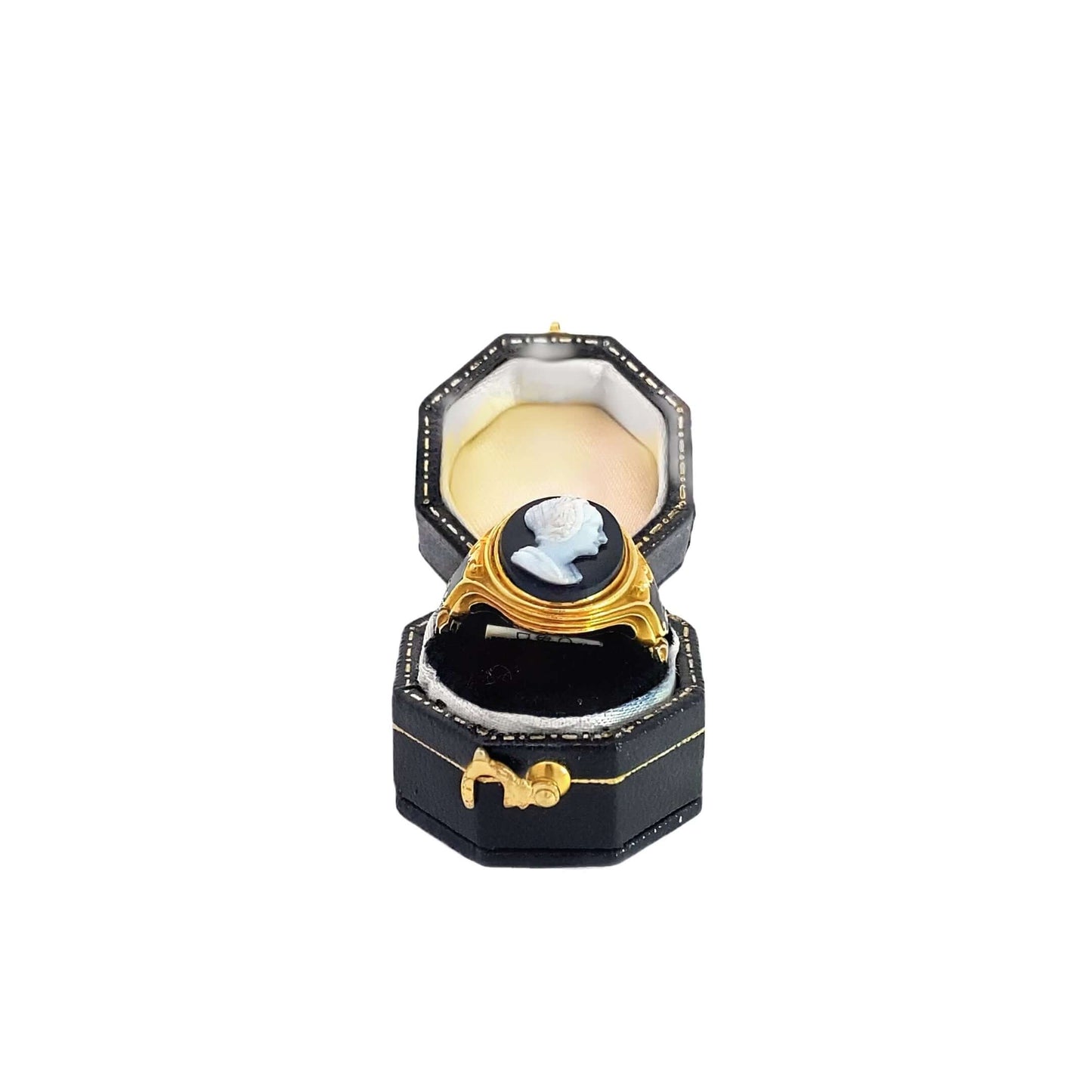 Early Victorian Cameo Portrait Mourning RingIntroducing the Early Victorian Cameo Portrait Mourning Ring, a captivating piece from 1854 that exudes timeless elegance and historical significance. This size 7 ring, weighing 9.4 grams, is meticulously crafte