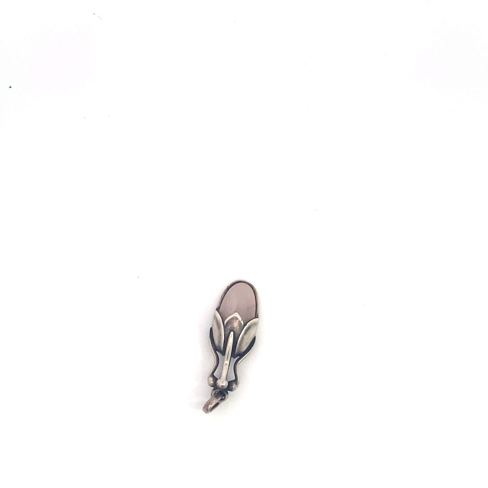 Georg Jensen Rose Quartz PendantAge: contemporary Dimensions: 1.25inchesGeorg Jensen Rose Quartz PendantAge: contemporary Dimensions: 1.25inches