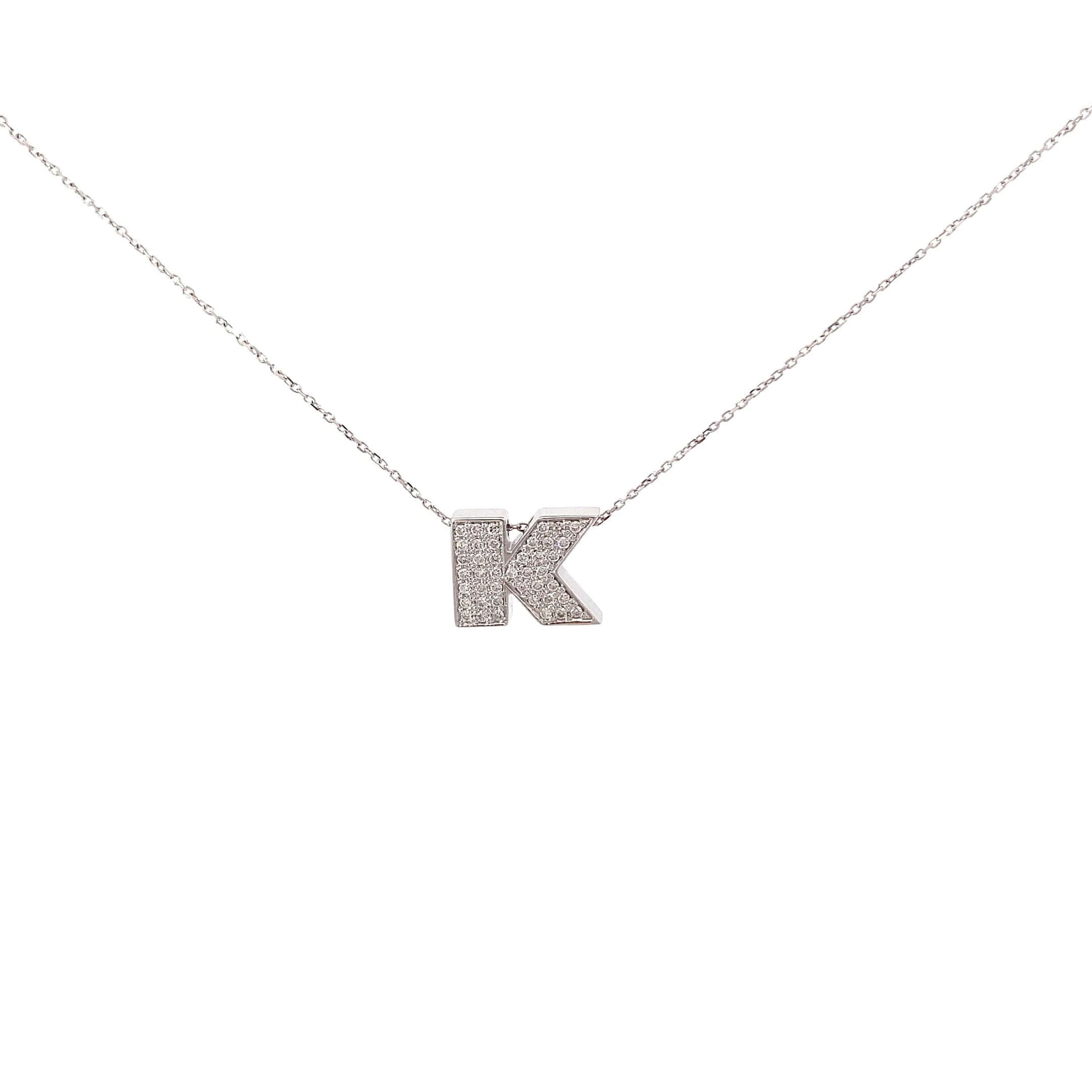 Shine Bright: K Pendant with Diamonds in 18k WGElevate your style with our adjustable 18k white gold K Pendant, sparkling with diamonds. Perfectly sized for elegance.K Pendant with DiamondsMetal: 18k WG Dimensions: CHAIN IS ADJUSTABLE, 15.5 and 17.5 inche