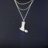 Hekate Aristera - The TorchBased on the traditional Figa the Mano Fica, this pendant is intended to be a symbol to ward of evil and protect the wearer. The inspiration behind it was Hekate, the greek god of witchcraft, the moon, and femininity. In her han