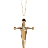 18k Gold Kelly Sword PendantA Luxe sword 18k Gold Kelly Sword Pendant for the individual wanting to make a powerful statement. Our Jewelry is proudly idealized, and produced in NYC.18k Gold Kelly Sword PendantA Luxe sword pendant for the individual wantin