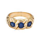 Hand Chased Victorian Ring with SapphiresA lovely c. 1890s Victorian ring hand chased with what appears to be a snake motif. 3 large sapphires are set into the ring. This ring has an amazing weight to it. Condition: Normal antique wear, very minimal scrat
