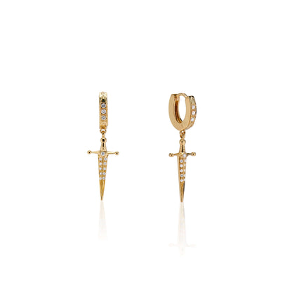 18k Gold Kelly Sword EarringsA Pair of solid gold 18k Gold Kelly Sword Earrings that make a statement. Swords are iconic symbols of strength and these unisex earrings embody this. 18k Gold Kelly Sword EarringsA Pair of solid gold earrings that make a stat