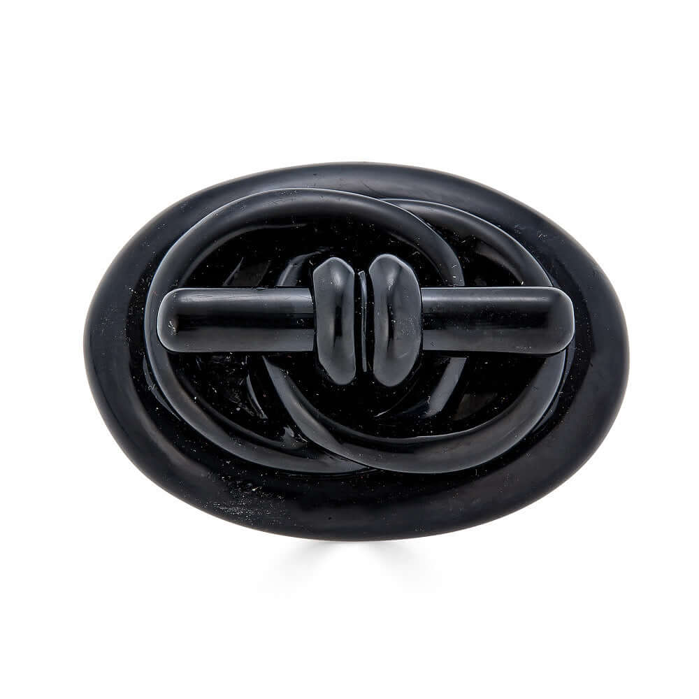 Whitby Jet Knot BroochA gorgeous and bold whitby jet mourning brooch from the 1870s. It is completed hand carved and is large. An exceptional example of mourning jewelry trends in the Victorian era. Condition: Normal antique wear, some flea bites and abra