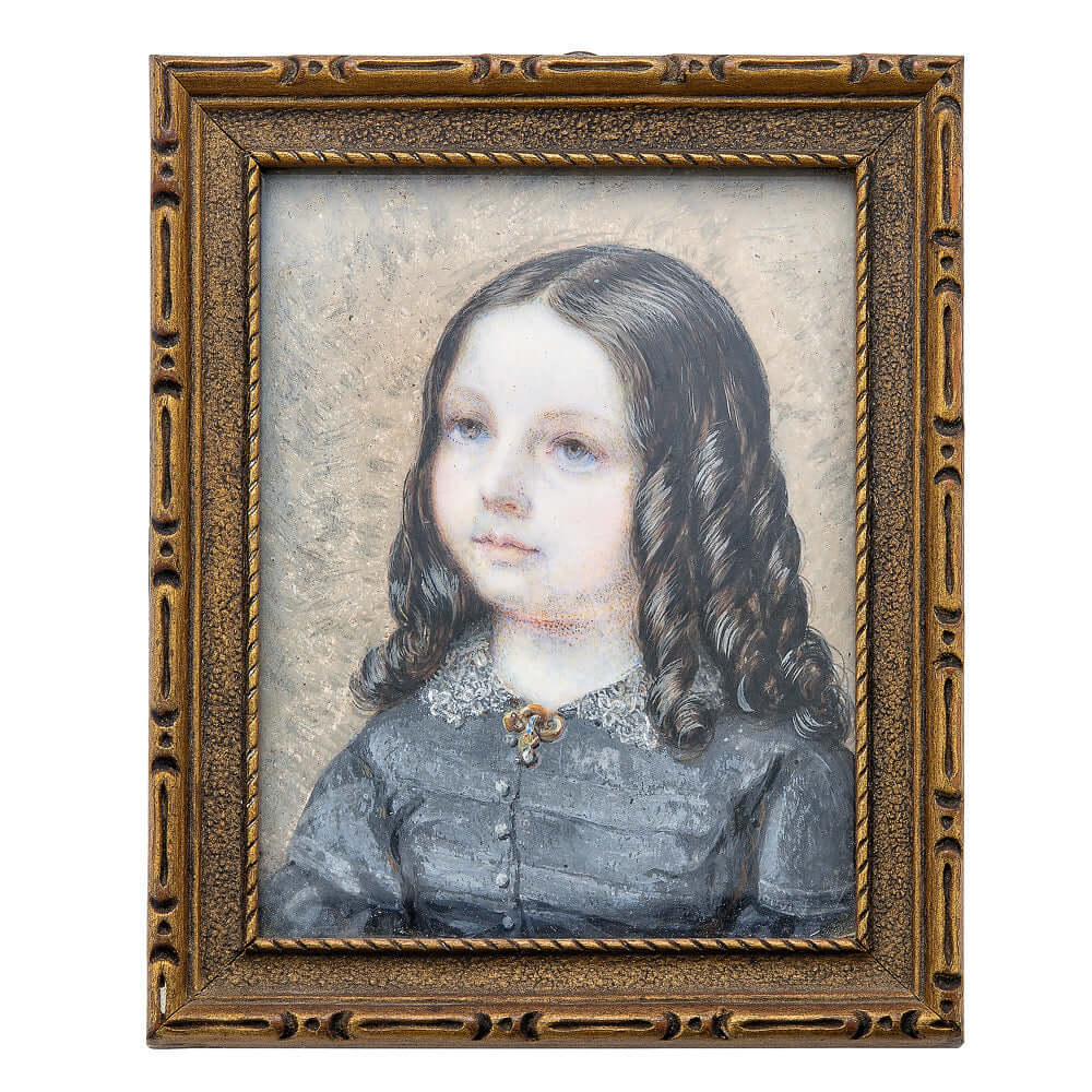 Portrait Miniature of a Jacksonian Era Girl with Long Ringlets of Dark HairThis miniature will certainly appeal to collectors of both portrait miniatures and early Americana. The subject wears a gray dress with a lace collar. She also wears a golds brooch