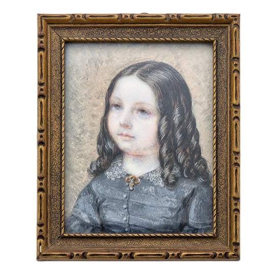 Portrait Miniature of a Jacksonian Era Girl with Long Ringlets of Dark HairThis miniature will certainly appeal to collectors of both portrait miniatures and early Americana. The subject wears a gray dress with a lace collar. She also wears a golds brooch