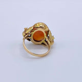 Antique Victorian Carnelian Peacock RingA gorgeous late Victorian ring with a substantial central carnelian stone. This ring has beautiful ruffled gold work around the stone. Two peacocks are suspended right above the shank. Condition: Normal antique wear