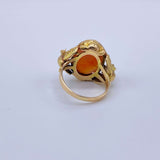Antique Victorian Carnelian Peacock RingA gorgeous late Victorian ring with a substantial central carnelian stone. This ring has beautiful ruffled gold work around the stone. Two peacocks are suspended right above the shank. Condition: Normal antique wear