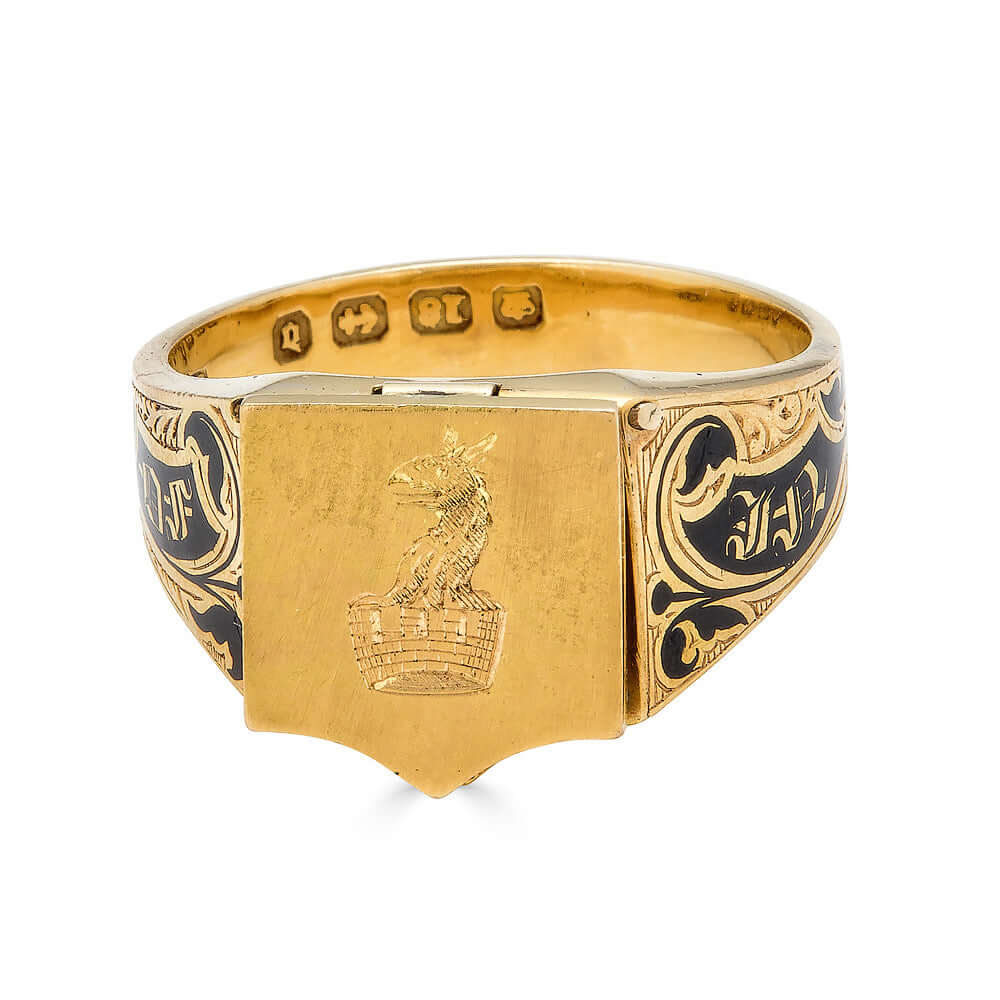 Black Enamel Mourning Ring with Hair CompartmentA special and lovely example of Victorian Mourning Jewelry. A gold mourning ring with a compartment that opens up to reveal woven hair behind glass. On the lid appears to be a crest with a gryphon and crown.