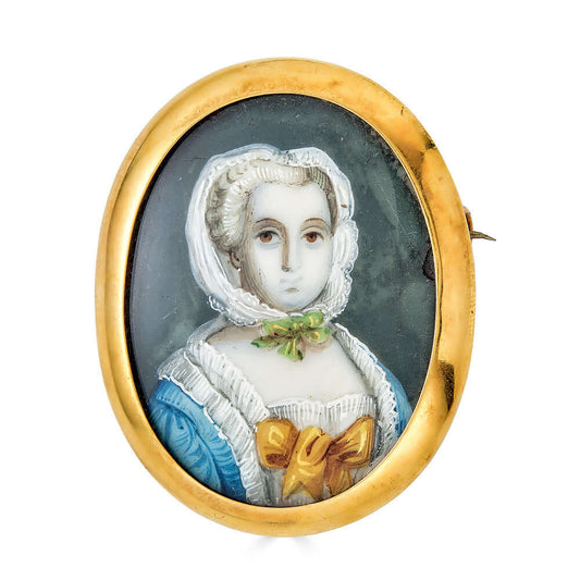 Simeon Family Portrait Miniature BroochLate Georgian era brooch featuring a watercolor portrait miniature linked to the Simeon family, housed in gilt with historical allure.Portrait Miniature of an Unknown Ancestor of the Family of Rev. Geoffrey Barringto