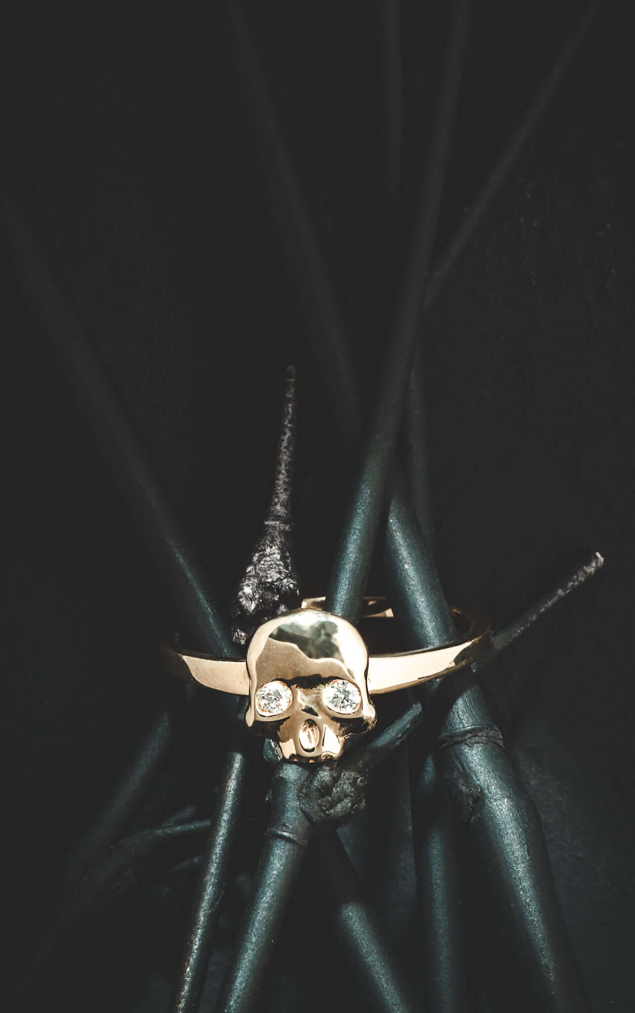 Diamond Ossification RingA little skull ring for every day wear with two shimmery diamonds in its eyes. We wanted to design a fun and simple skull ring that adds the perfect amount of goth and that could stack well with other rings. Our Jewelry is proudly