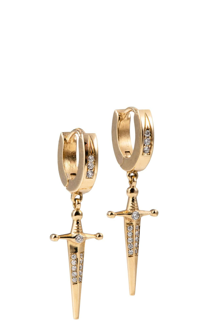 Earrings 18k Gold Kelly Sword Earrings A Pair of solid gold 18k Gold Kelly Sword Earrings that make a statement. Swords are iconic symbols of strength and these unisex earrings embody this. KIL N.Y.C.