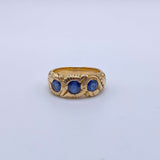 Hand Chased Victorian Ring with SapphiresA lovely c. 1890s Victorian ring hand chased with what appears to be a snake motif. 3 large sapphires are set into the ring. This ring has an amazing weight to it. Condition: Normal antique wear, very minimal scrat