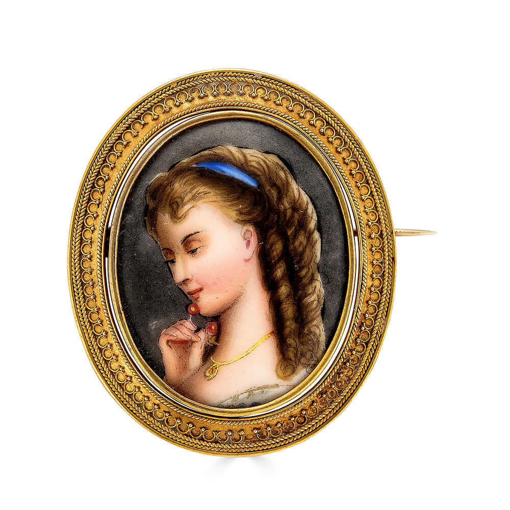 Painted Portrait Miniature of Woman with CherriesA lovely victorian Painted Portrait Miniature of Woman with Cherries. There is lovely Etruscan revival wire work around the frame of the piece and woven hair.Painted Portrait Miniature of Woman with Cherrie