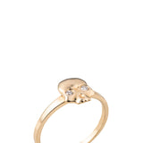 Diamond Ossification RingA little skull ring for every day wear with two shimmery diamonds in its eyes. We wanted to design a fun and simple skull ring that adds the perfect amount of goth and that could stack well with other rings. Our Jewelry is proudly