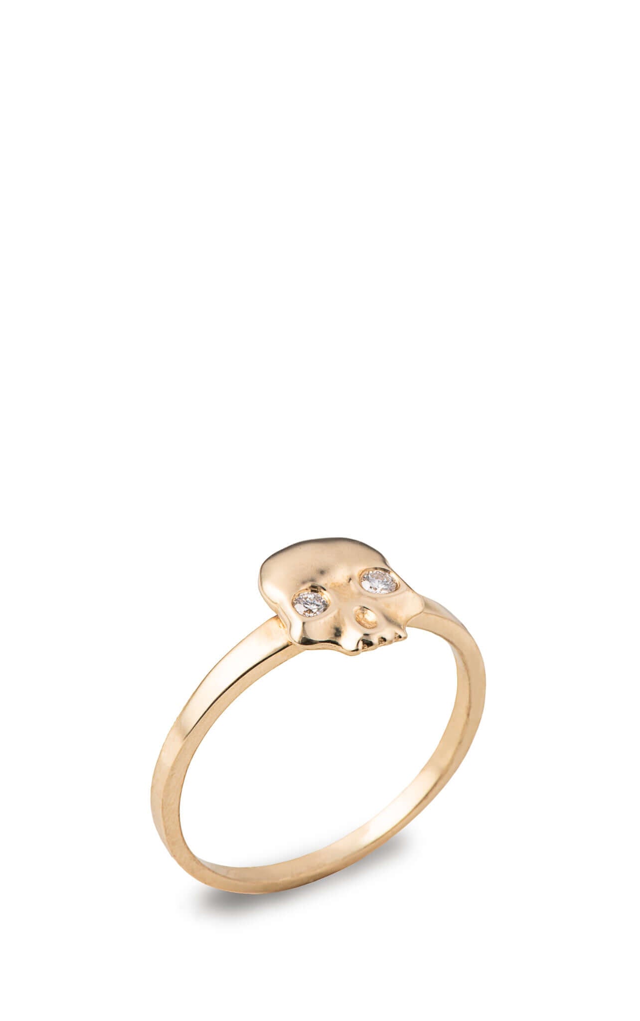 Diamond Ossification RingA little skull ring for every day wear with two shimmery diamonds in its eyes. We wanted to design a fun and simple skull ring that adds the perfect amount of goth and that could stack well with other rings. Our Jewelry is proudly