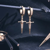 18k Gold Kelly Sword PendantA Luxe sword 18k Gold Kelly Sword Pendant for the individual wanting to make a powerful statement. Our Jewelry is proudly idealized, and produced in NYC.18k Gold Kelly Sword PendantA Luxe sword pendant for the individual wantin