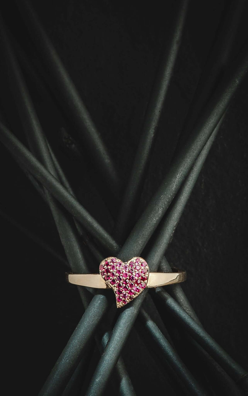 Rings Pave Witchy Love Ring A gorgeous pave set ring with a little extra bling. This heart is based on a witch’s heart; a popular motif in antique jewelry which was worn as a symbol of protection. Solid 14k gold with gorgeous natural pave stones hand set