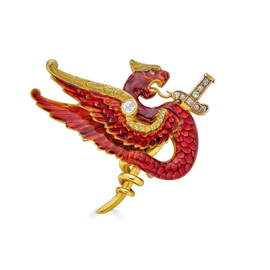 Red Enameled Gryphon Brooch with Diamond SwordA spectacular enameled gryphon brooch created with luminous red enamel that looks like mother of pearl. A jeweled sword appears to pierce the heart of the creature. Magnificent and statement making. Condition: