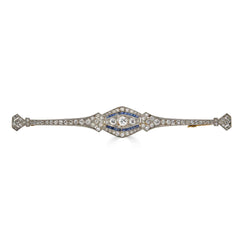 Elongated Art Deco Platinum Brooch with Diamonds and Calibrated Sapphires