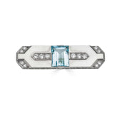 Vintage Retro Aquamarine and Diamond Platinum BroochAn extravagant and lovely retro brooch expertly crafted in solid platinum with a gorgeous central aquamarine and diamond accents. It has an amazing weight to it and the aquamarine is beautifully faceted.