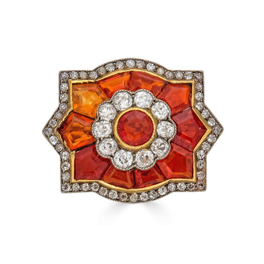 Art Deco Platinum Fire Opal Brooch with Diamond SurroundsOne of the most gorgeous pieces of jewelry I've seen in quite some time. A fiery and amazing brooch crafted in platinum with the most amazing calibrated fire opals we've seen. Adding to all of that