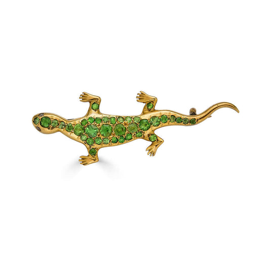 Antique Dementoid Garnet Salamander BroochZoomorphic jewelry is some of our favorites and antique salamander jewelry gives us all the feels. The body of this slithery salamander features a melee of different cut dementoid garnets peppered all over its bod