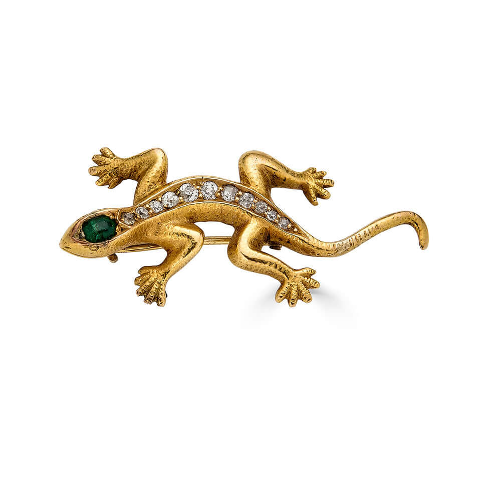 Antique Emerald & Diamond Salamander BroochZoomorphic jewelry is some of our favorites and antique salamander jewelry gives us all the feels. The body of this slithery salamander features an emerald in its head with a row of diamonds down its body. While